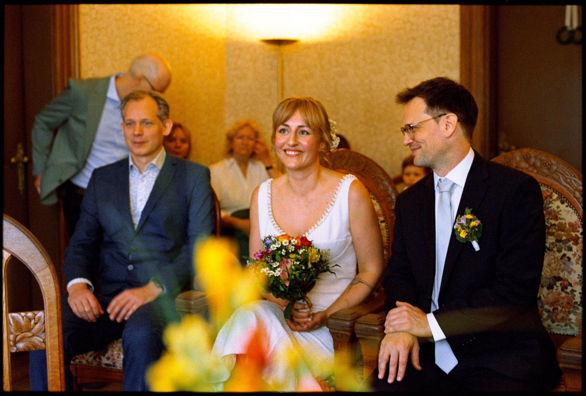 The couple with seated guests at the ceremony, Irena & Peter wedding in Berlin