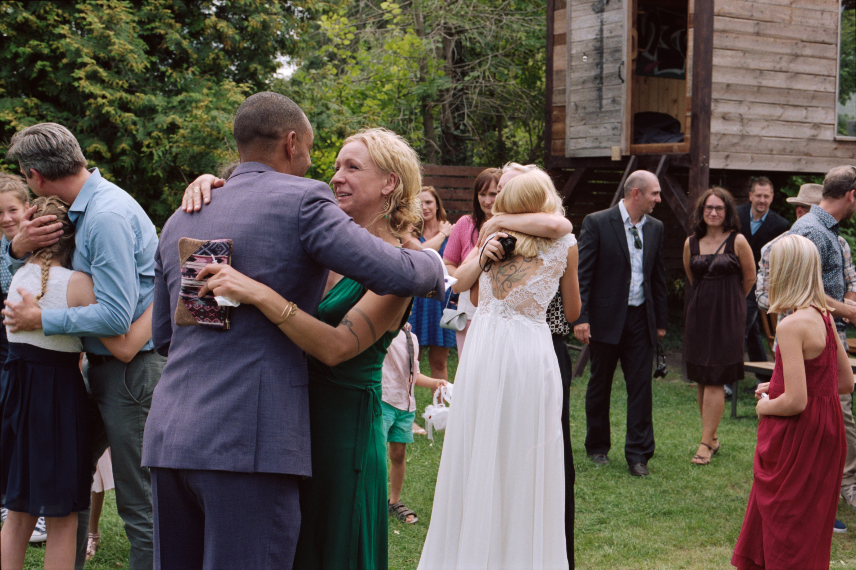 The groom embracing guests after the ceremony, Linda & Thomas wedding in Berlin