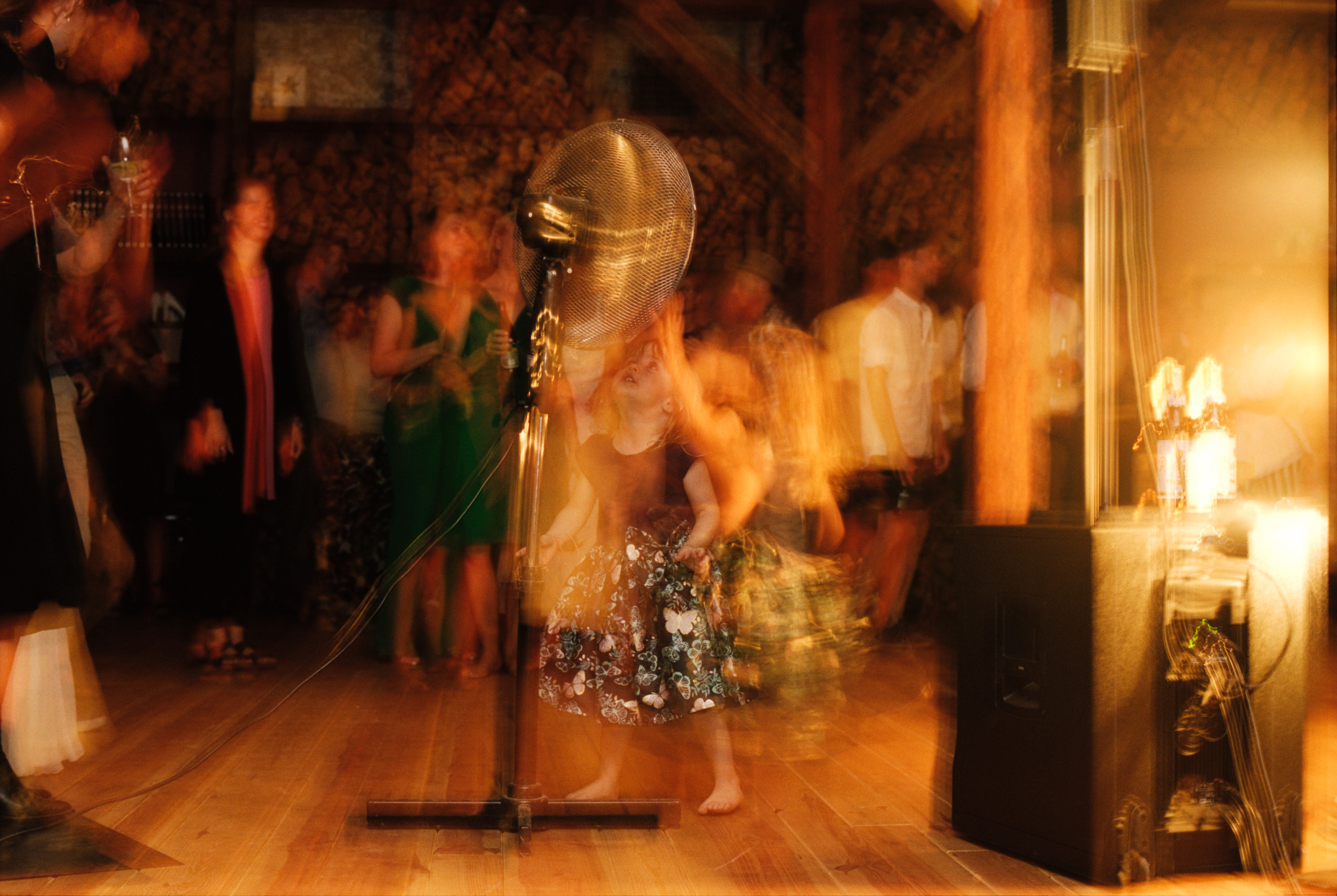 Dancing in candlelight, a long-exposure film frame, Linda & Thomas wedding in Berlin