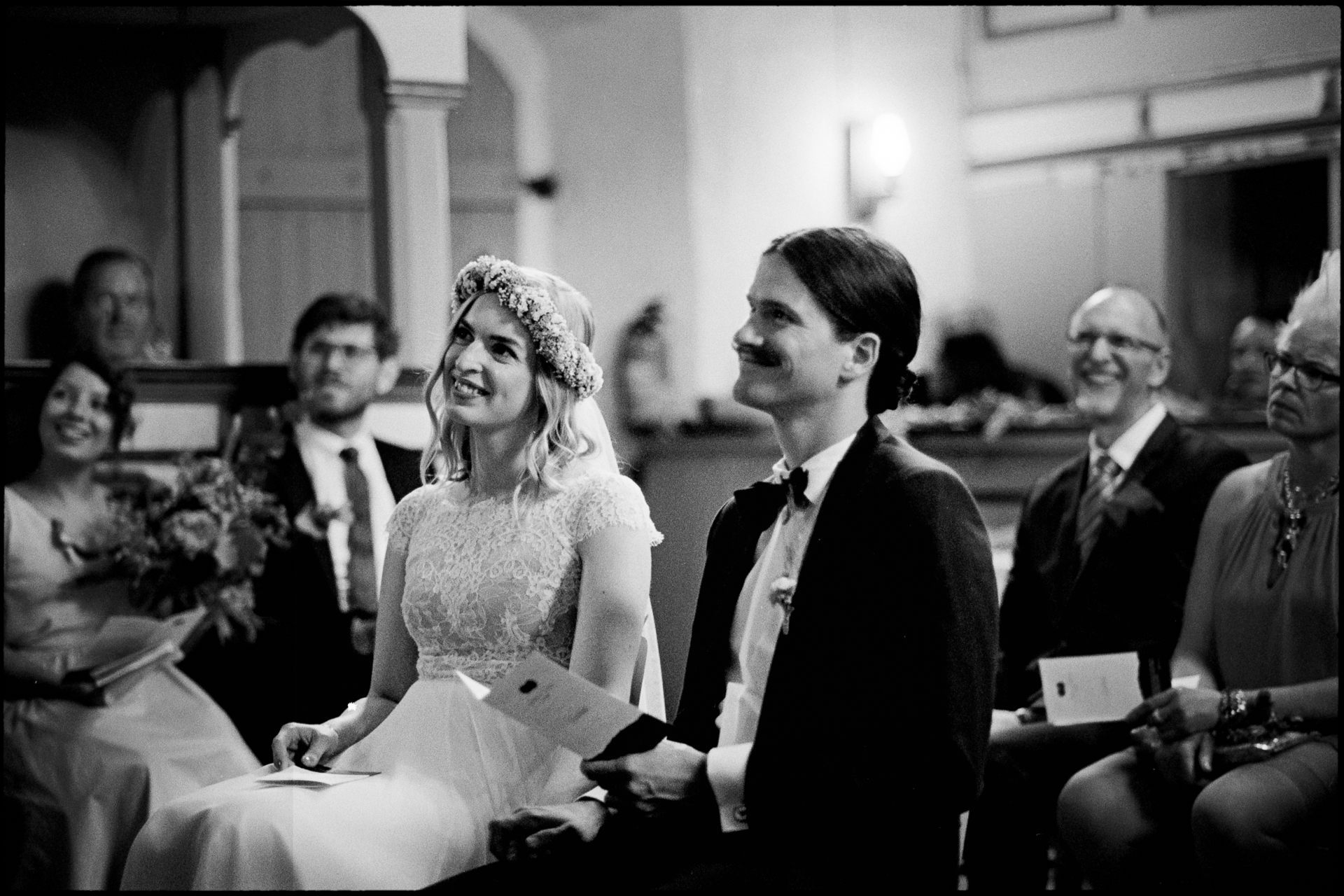 The couple during the ceremony, in black and white, Maike & Daniel wedding in Brandenburg