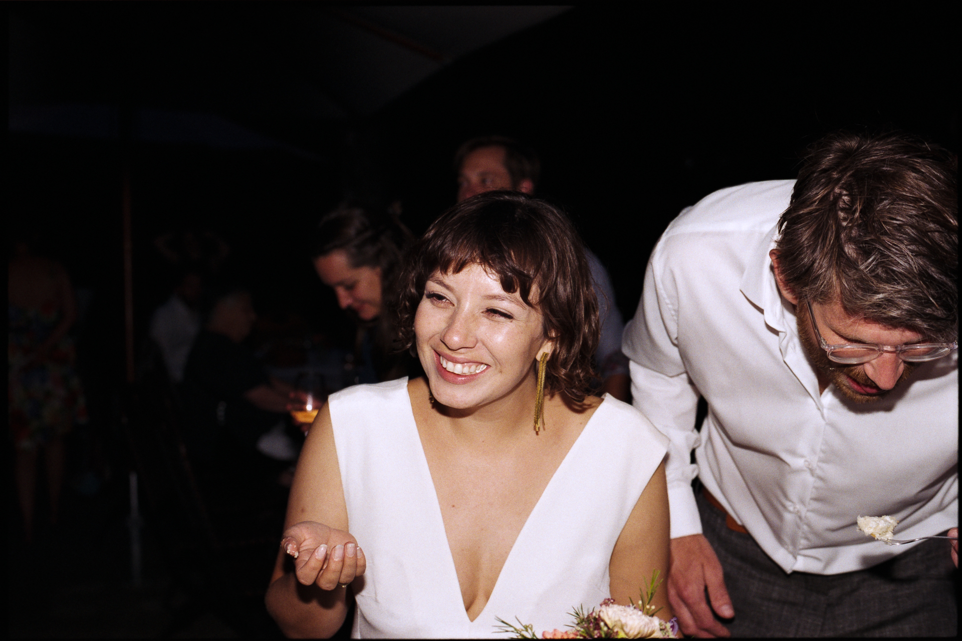 The bride laughing beside the groom in the evening, Suelyn & Pascal wedding in Groß Glienicke, Potsdam