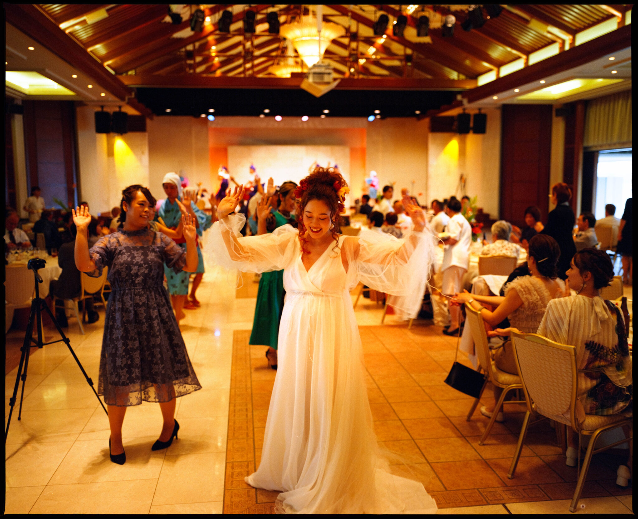 Guests dancing together in the hall, Sugano & Jonas wedding in Okinawa